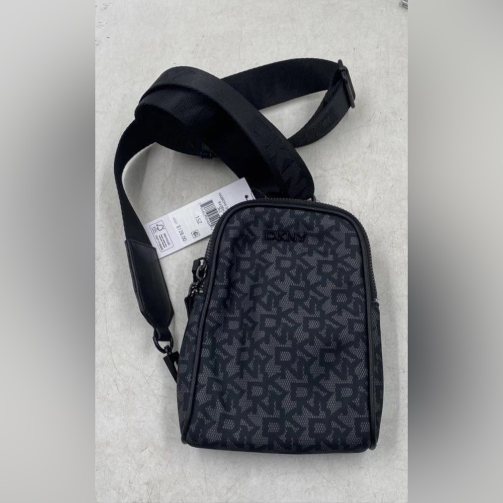 DKNY Woman's Black Monogram Crossbody bag . Adjustable strap